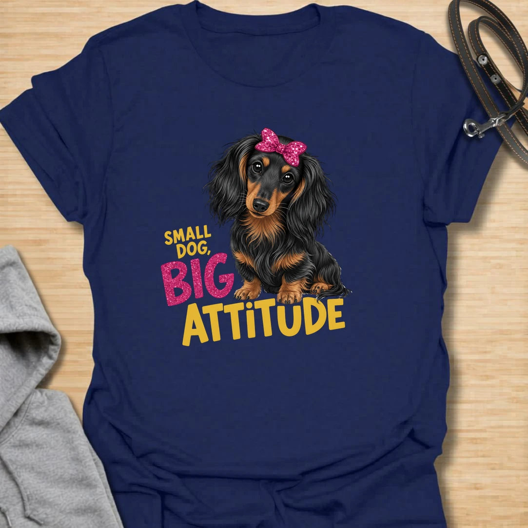 Small Dog Attitude t-shirt for dachshund lovers who know tiny legs can come with a very big personality. This cute long-haired dachshund design features a bright bow and the phrase “Small Dog, Big Attitude.” Perfect for doxie moms, small dog owners, and anyone who loves a sassy sausage dog.