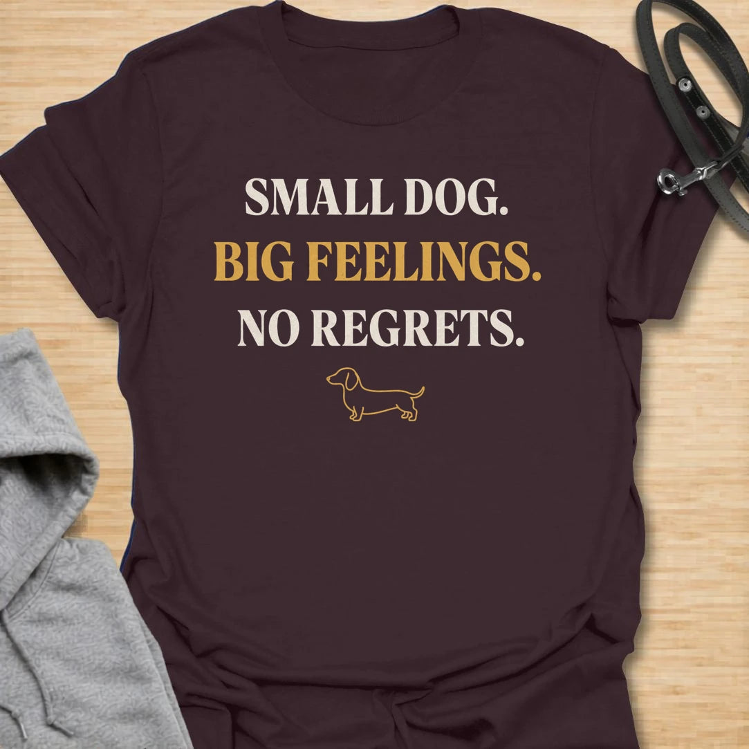 This Small Dog Big Feelings t-shirt is made for dachshund lovers who know their tiny long dog has a huge personality and absolutely no regrets. Featuring bold simple typography, a small dachshund line illustration, and a funny breed-specific message, this design has a clean dog-parent feel that doxie owners will instantly understand. Perfect for dachshund moms, dachshund dads, wiener dog fans, rescue dog lovers, and anyone whose small dog feels everything very dramatically.