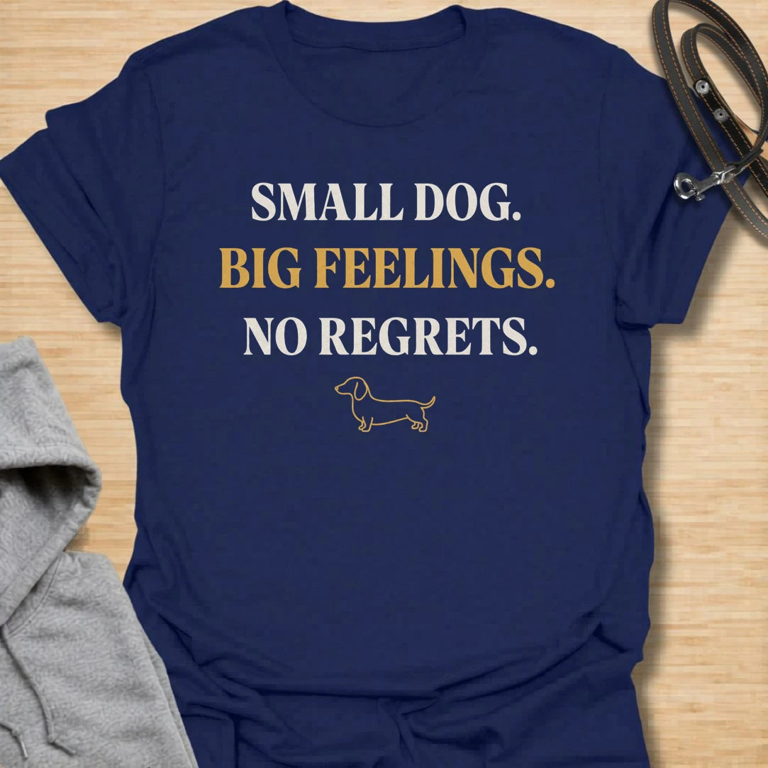 This Small Dog Big Feelings t-shirt is made for dachshund lovers who know their tiny long dog has a huge personality and absolutely no regrets. Featuring bold simple typography, a small dachshund line illustration, and a funny breed-specific message, this design has a clean dog-parent feel that doxie owners will instantly understand. Perfect for dachshund moms, dachshund dads, wiener dog fans, rescue dog lovers, and anyone whose small dog feels everything very dramatically.