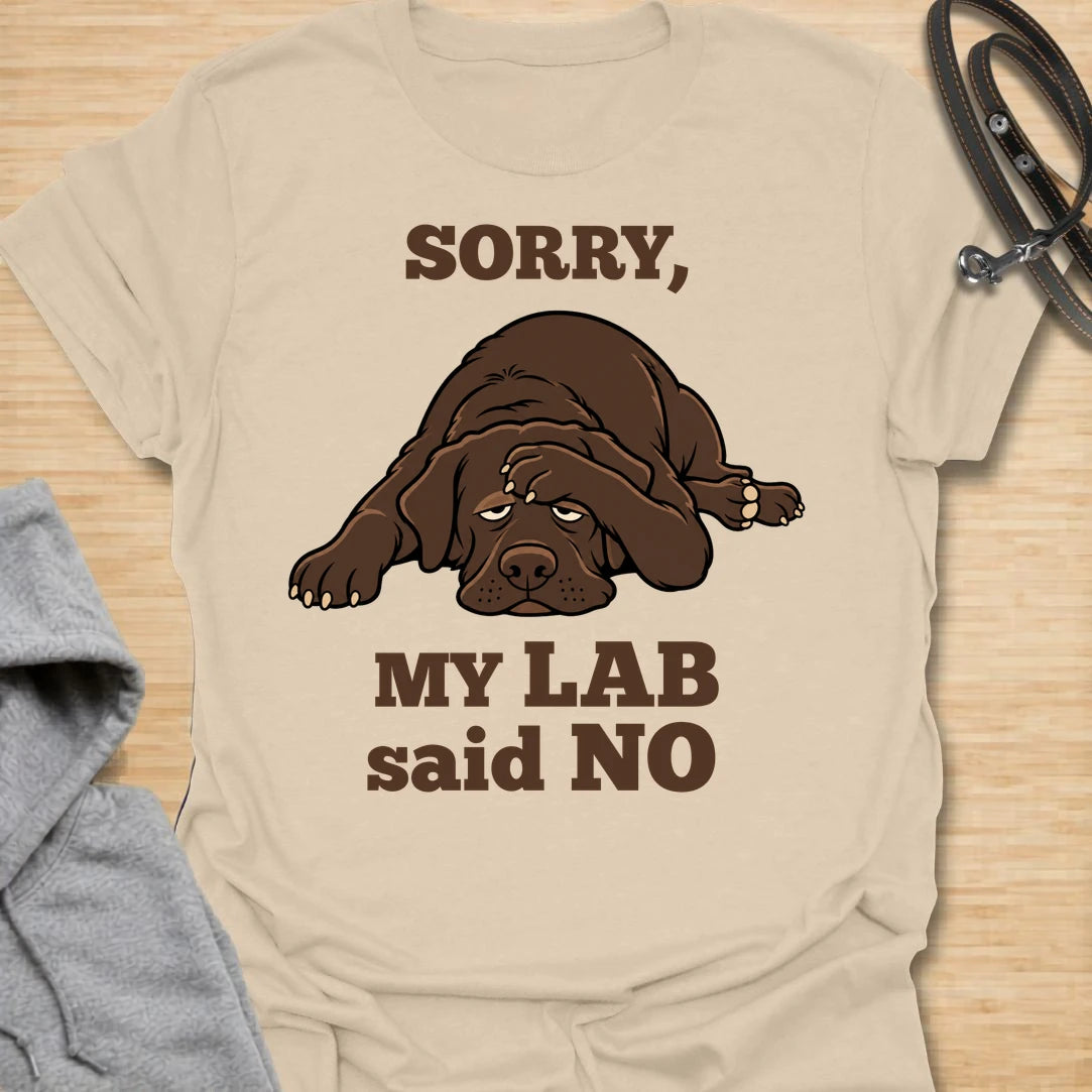 This Sorry, My Lab Said No t-shirt is made for Labrador lovers who know their dog’s opinion carries serious weight. Featuring a grumpy chocolate Lab lying down with bold playful text, this design has a funny, stubborn-dog attitude that Labrador owners will instantly understand. Perfect for Lab moms, Lab dads, chocolate Lab lovers, Labrador owners, rescue dog fans, and anyone who lets their dog make the final decision.vSand