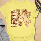 This Today I Chose My Dog Over People Again t-shirt is made for dog lovers who would rather hang out with their pup than deal with unnecessary social plans. Featuring a cool cartoon dog in sunglasses holding a drink, with bold retro lettering and a playful vintage vibe, this design is funny, snarky, and full of dog-parent attitude. Perfect for dog moms, dog dads, rescue dog owners, introverts, pet parents, and anyone who proudly chooses dogs over people. Cornsilk