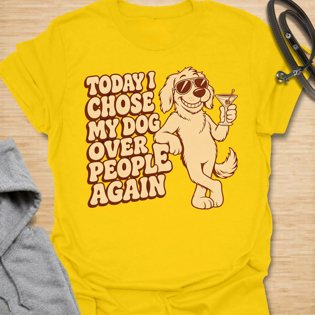 This Today I Chose My Dog Over People Again t-shirt is made for dog lovers who would rather hang out with their pup than deal with unnecessary social plans. Featuring a cool cartoon dog in sunglasses holding a drink, with bold retro lettering and a playful vintage vibe, this design is funny, snarky, and full of dog-parent attitude. Perfect for dog moms, dog dads, rescue dog owners, introverts, pet parents, and anyone who proudly chooses dogs over people. Daisy