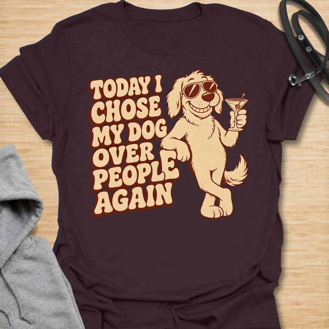 This Today I Chose My Dog Over People Again t-shirt is made for dog lovers who would rather hang out with their pup than deal with unnecessary social plans. Featuring a cool cartoon dog in sunglasses holding a drink, with bold retro lettering and a playful vintage vibe, this design is funny, snarky, and full of dog-parent attitude. Perfect for dog moms, dog dads, rescue dog owners, introverts, pet parents, and anyone who proudly chooses dogs over people. Dark Chocolate