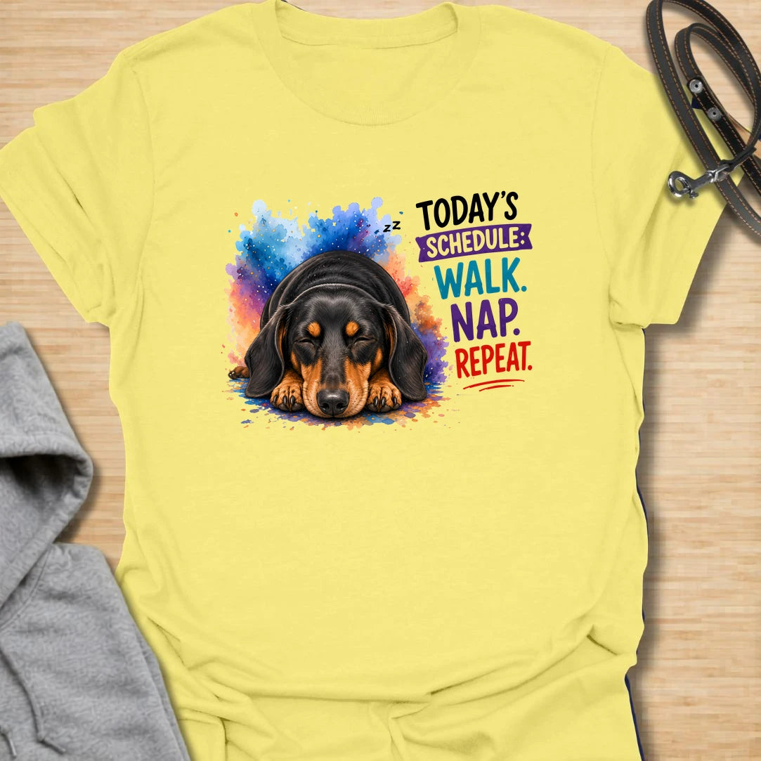 Walk Nap Repeat t-shirt for dachshund lovers whose dog’s perfect schedule is simple: walk, nap, repeat. This cute sleeping doxie design has a colorful playful style and is perfect for dog moms, sausage dog owners, and pet parents who love relaxed dog humor. A sweet gift for dachshund fans and anyone whose pup lives for walks and naps.