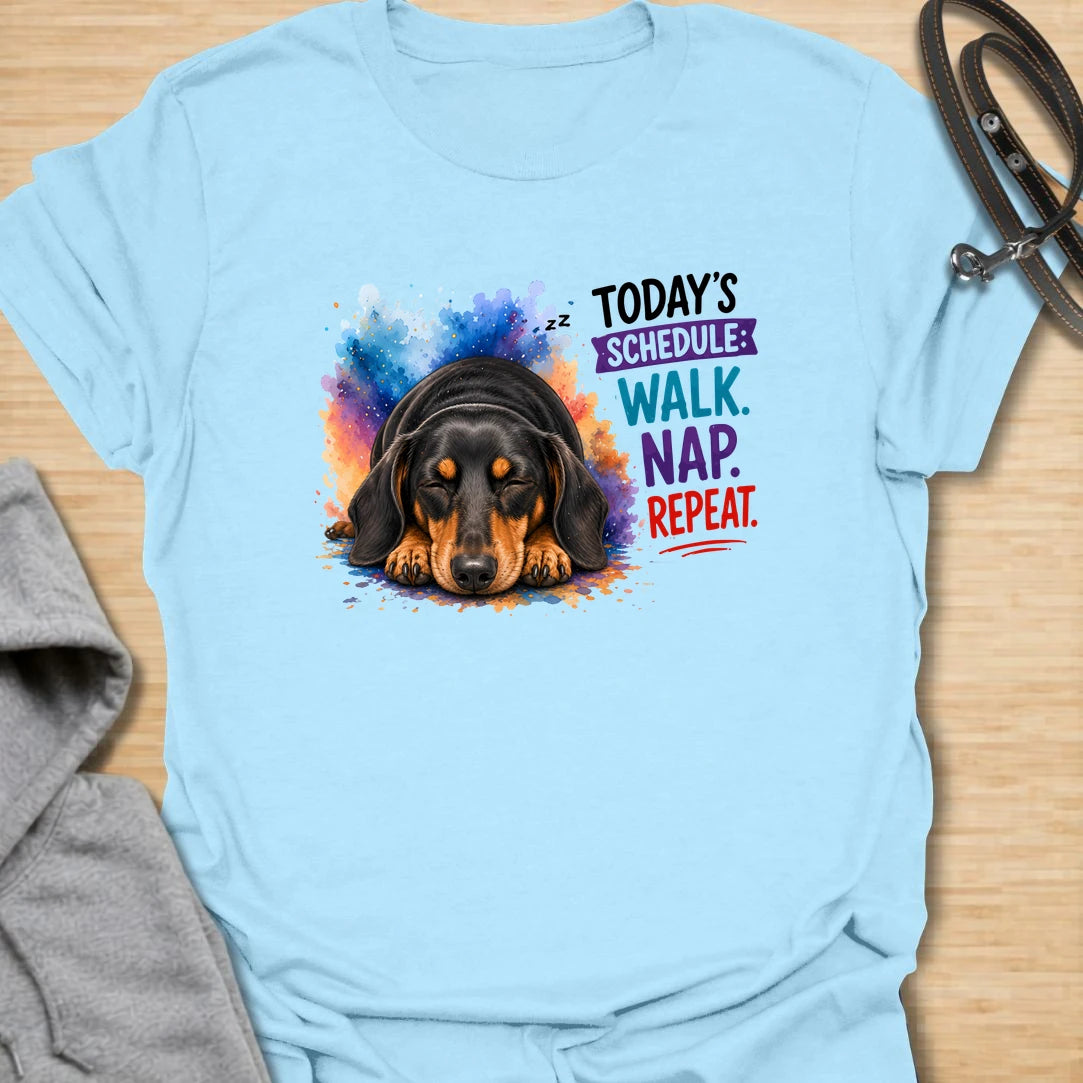 Walk Nap Repeat t-shirt for dachshund lovers whose dog’s perfect schedule is simple: walk, nap, repeat. This cute sleeping doxie design has a colorful playful style and is perfect for dog moms, sausage dog owners, and pet parents who love relaxed dog humor. A sweet gift for dachshund fans and anyone whose pup lives for walks and naps.