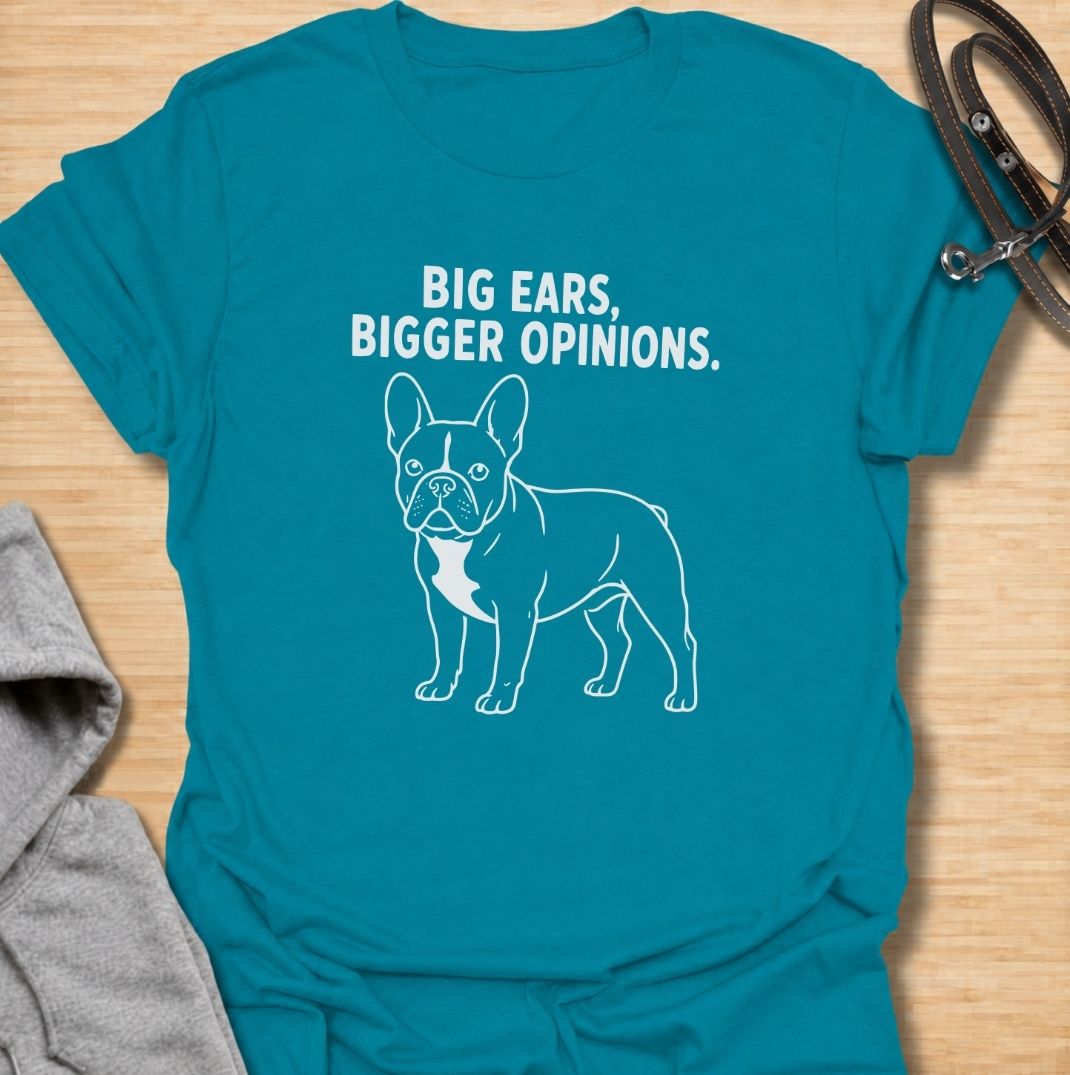 Big ears come with even bigger opinions. This funny French Bulldog T-shirt features a clean line-art Frenchie with the bold phrase “Big Ears, Bigger Opinions.” A simple, wearable design for Frenchie moms, Frenchie dads, and anyone who knows these compact dogs are never short of personality.
