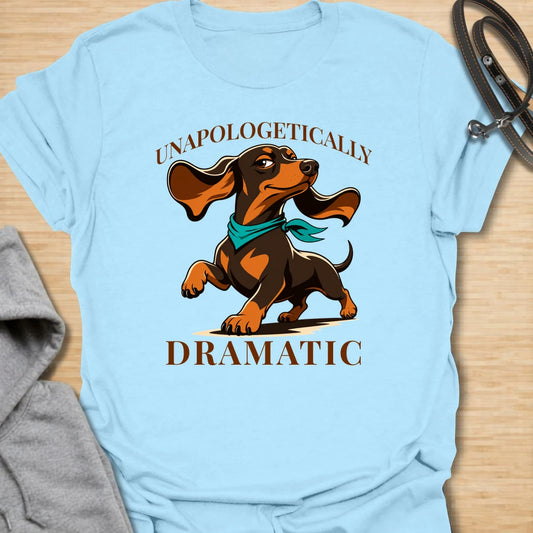Unapologetically Dramatic Dachshund t-shirt for doxie lovers who know the drama is part of the breed. This bold design features a dachshund in a theatrical pose with strong vintage-style lettering. It is perfect for dachshund moms, dachshund dads, and sausage dog owners who live with big feelings in a tiny body. A funny gift for anyone who understands the dramatic side of wiener dogs.
