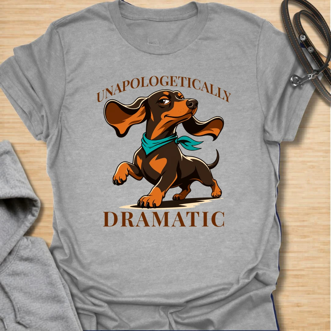 Unapologetically Dramatic Dachshund t-shirt for doxie lovers who know the drama is part of the breed. This bold design features a dachshund in a theatrical pose with strong vintage-style lettering. It is perfect for dachshund moms, dachshund dads, and sausage dog owners who live with big feelings in a tiny body. A funny gift for anyone who understands the dramatic side of wiener dogs.