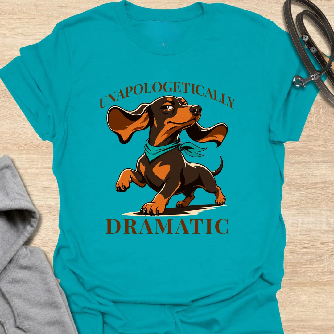 Unapologetically Dramatic Dachshund t-shirt for doxie lovers who know the drama is part of the breed. This bold design features a dachshund in a theatrical pose with strong vintage-style lettering. It is perfect for dachshund moms, dachshund dads, and sausage dog owners who live with big feelings in a tiny body. A funny gift for anyone who understands the dramatic side of wiener dogs.