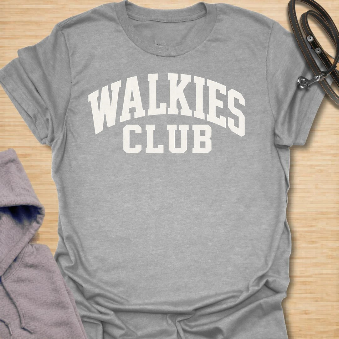 This Walkies Club t-shirt is made for dog owners who know the daily walk is less of a choice and more of a lifestyle. The clean varsity-style text design has a simple sporty look that works perfectly for dog moms, dog dads, rescue dog owners, and anyone whose day revolves around walk time. A great gift for dog walkers, pet parents, puppy owners, and anyone proudly signed up to the walkies club. Sport Grey