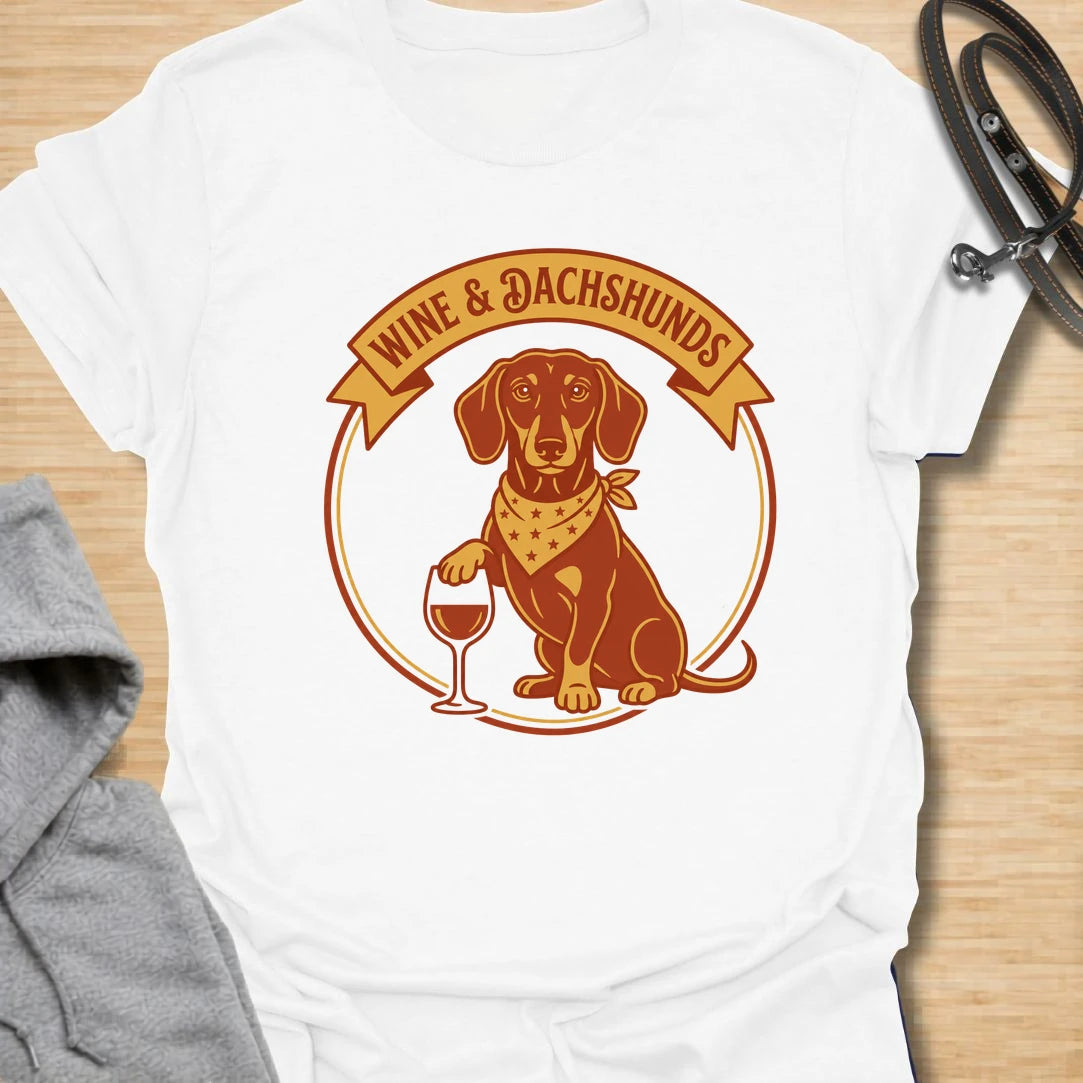 This wine and dachshunds t-shirt is made for doxie lovers who enjoy a good glass of wine and even better dog company. The warm vintage badge design features a dachshund with a wine glass, giving it a cozy, playful feel. It is perfect for dachshund moms, wine lovers, dog moms, and anyone whose ideal evening includes a long dog and a favorite drink. A fun gift for birthdays, dog mom friends, wine nights, or casual weekends at home.