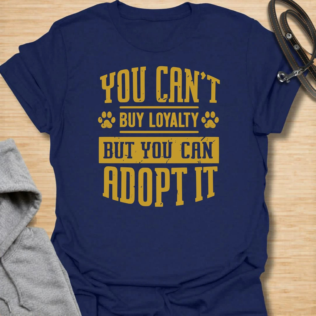 This You Can’t Buy Loyalty But You Can Adopt It t-shirt is made for rescue dog lovers who believe the best kind of love comes from giving a dog a second chance. Featuring bold distressed typography with paw print details, this design has a simple, meaningful rescue-dog message that is easy to wear every day. Perfect for rescue dog moms, rescue dog dads, shelter dog adopters, foster families, animal lovers, and anyone who proudly supports adoption. Navy